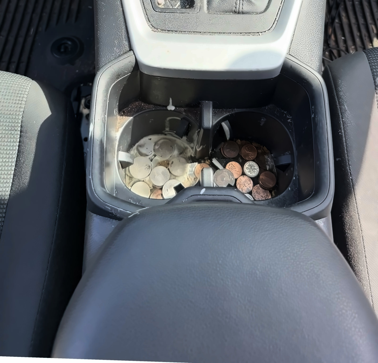 Console & cupholders before